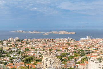 Fototapeta na wymiar Vue sur Marseille, le Château d'If, l'île du Frioul et l'île Pomègues depuis la Basilique Notre-Dame-de-la-Garde