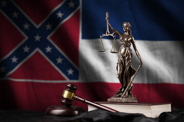 Mississippi new US state flag with statue of lady justice, constitution and judge hammer on black...