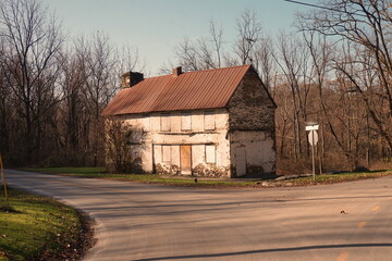 Fototapeta na wymiar Old Abandoned Peeling White Home in Rural Fall Setting