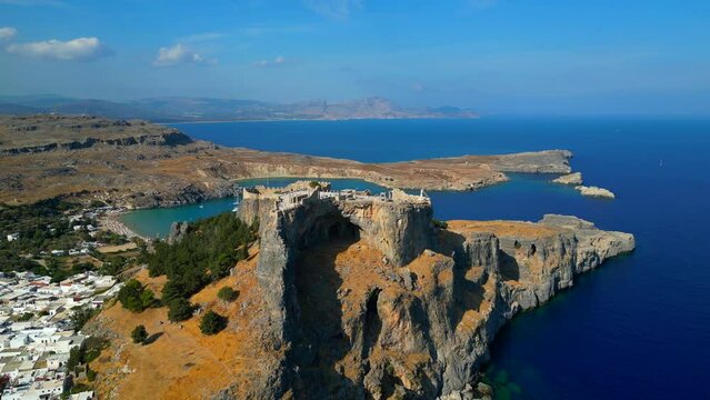 Lindos is a town on the Greek island of Rhodes. It&rsquo;s known for its clifftop acropolis, which features monumental 4th-century gates and reliefs from about 280 B.C.