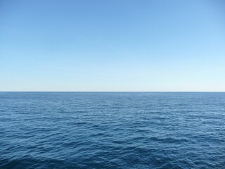 Beautiful shot of blue coast of Angel bay in Monaco