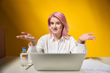 Woman looking at the camera and explain something