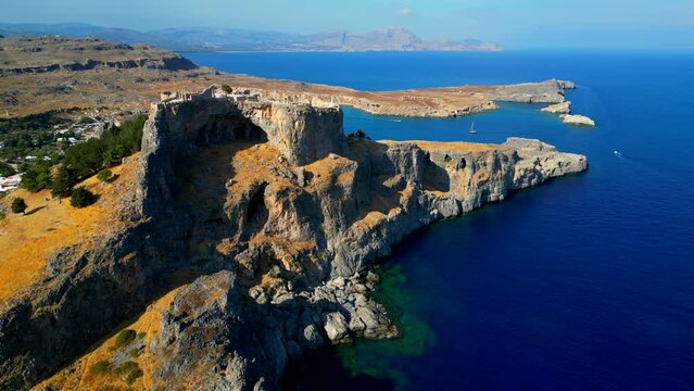 Lindos is a town on the Greek island of Rhodes. It&rsquo;s known for its clifftop acropolis, which features monumental 4th-century gates and reliefs from about 280 B.C.