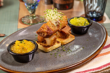 Typical peruvian food and drinks, pork rinds in vacuum