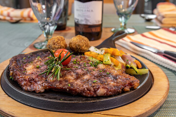Typical colombian food and drinks, rib eye beef cut