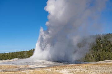 Closeup shot of the Old Faithful cone geyser in Yellowstone National Park in Wyoming, United States