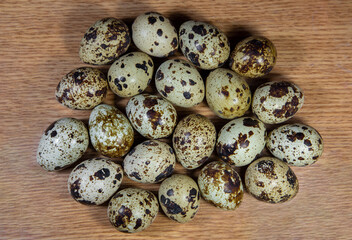 A group of quail eggs in the foreground