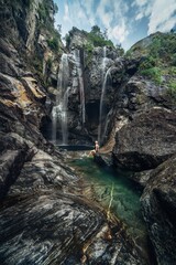 Vertical shot of the waterfall in Switzerland