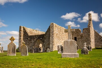 Beautiful shot of the ruined monastery Clonmacnoise with its cemetery in County Offaly, Ireland