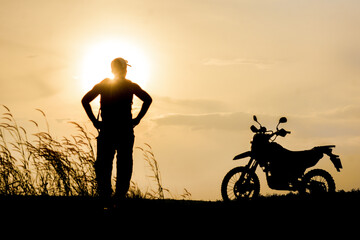 Blurred lens, motocross on a beautiful light mountain independent adventure tourism concept