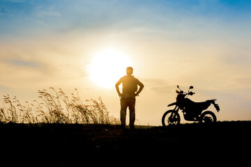 man with motocross beautiful light mountain independent adventure tourism concept