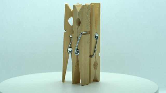 wooden clothespin rotates