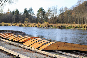 CERVENY KLASTOR, SLOVAKIA - NOVEMBER 09, 2022: Wooden rafts for transporting tourists on the Dunajec River in Slovakia.