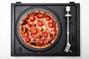 Pizza Pepperoni on a vintage turntable ready to go