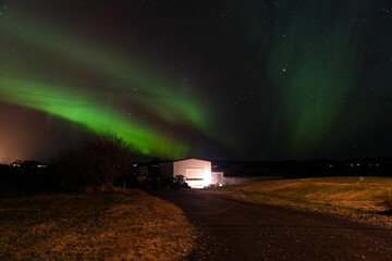 Beautiful display of Northern lights, Aurora borealis in a starry sky