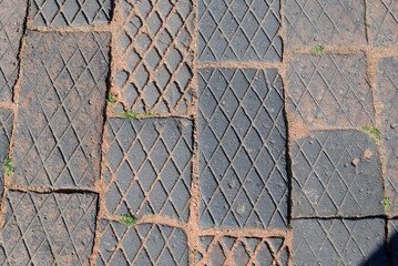 Old Textured Brick Pavement in Close Up 