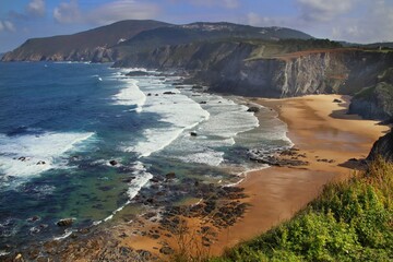 Aerial shot of the beach of O Picon strung along the Picon Loiba cliffs in Galicia Spain