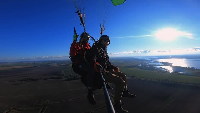 paragliding in tandem at sunset, sports, extreme