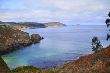 Fototapeta na wymiar Amazing shot of the path leading to Fucino do Porco in Lugo Galicia with a beautiful seascape