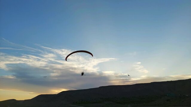 People powered paragliding in the sky