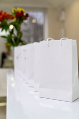 Commercial cardboard packaging. White paper empty packets.