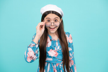 Portrait of teenager child girl in glasses. Kid at eye sight test. Girl with eyeglasses and looking at camera. Vision for children. Happy teenager, positive and smiling emotions.