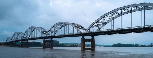 Mississippi River Bridge crossing from Illinois to Iowa over the Mississippi River, dramatic cloudscape