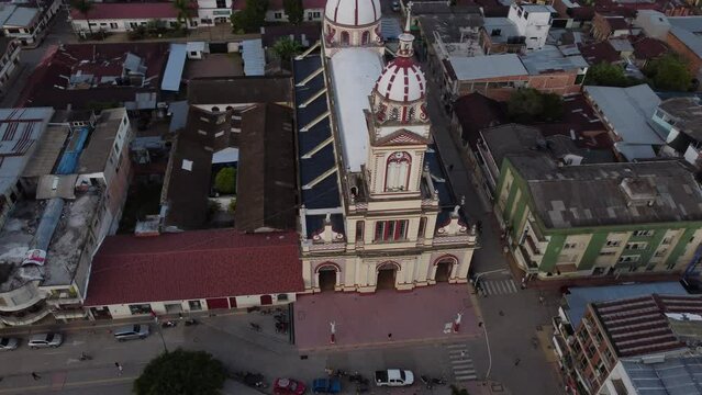 Circular aerial view of the town church in chaparral tolima colombia. concept of travel and towns
