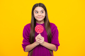 Teenage girl with lollipop, child eating sugar lollipops, kids sweets candy shop.