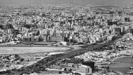 Doha, Qatar. Aerial view of city skyline from a flying airplane over the Qatar capital