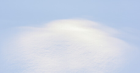 White snow in sunlight on a clear frosty day. Shadows on the snow. Bright snowy background with empty field for montage. Christmas background with snow. Natural wallpape