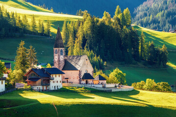 Church of Santa Maddalena in beautiful morning light. A beautiful view of the mountain scenery in...