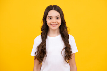 Happy teenager, positive and smiling emotions of teen girl. Pretty teenage girl in studio. Child...