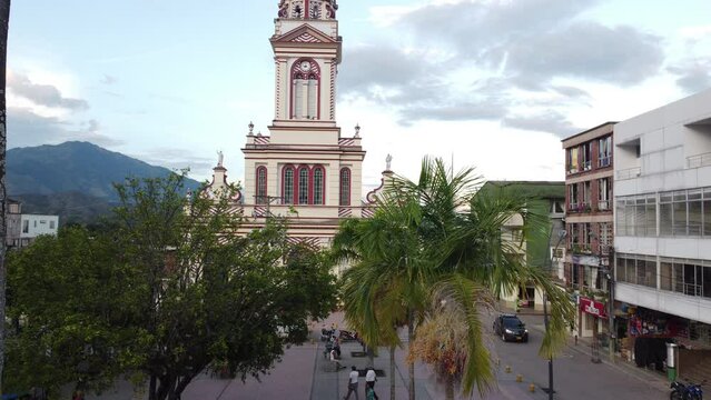 Upward aerial view of the town church in chaparral tolima colombia. concept of travel and towns