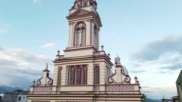 Upward aerial view of the town church in chaparral tolima colombia. concept of travel and towns