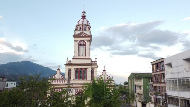 Upward aerial view of the town church in chaparral tolima colombia. concept of travel and towns