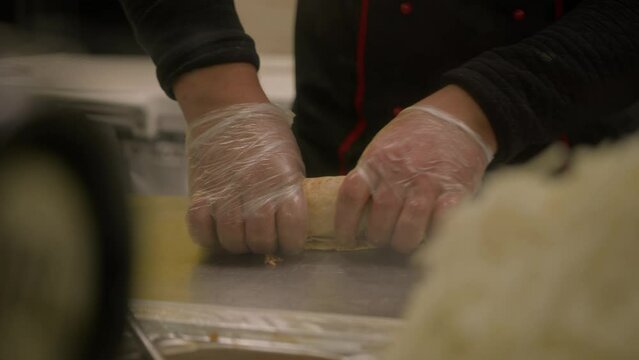 The process of creating fast food on street - shawarma, pita, doner kebab