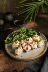Japanese sushi food. Maki ands rolls with shrimps, cucamber, and Cream cheese.