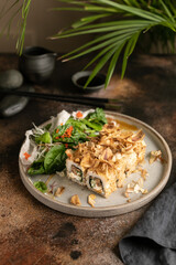 Japanese sushi food. Maki ands rolls with shrimps, cucamber, and Cream cheese.
