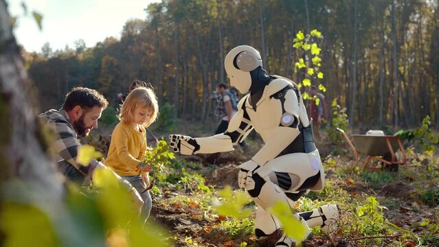 Caucasian father, daughter and humanoid planting tree together in garden or park. Handome man with small cute child and robot plant seedling of trees. Outside. Family with android working together.