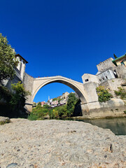 Fototapeta na wymiar Mostar - iconic old town with famous bridge in Bosnia and Herzegovina. popular tourist destination