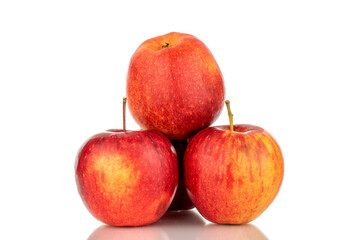 Fototapeta na wymiar Three red ripe apples, macro, isolated on white background.