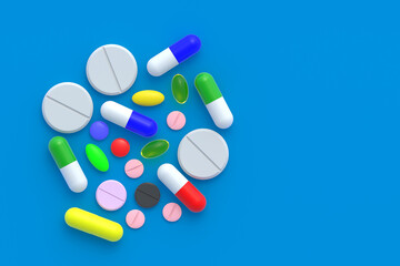 Various pills scattered on blue background. Concept of healthcare and medical. Dosage of medications and vitamins. Copy space. Top view. 3d render