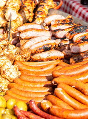 Delicious sausages from meat grilling over hot coals