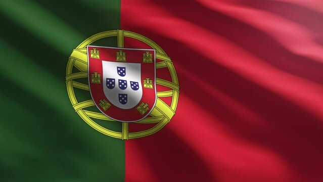 Wind shaking the official Portuguese Republic country flag ensign. Animation of the portugal country flag in green and red colours with a coat of arms. National state flag of european Portugal country