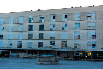 Studnia, old well and a hotel building. Zadar, Croatia.