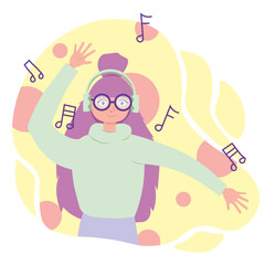 the girl listens to music on wireless headphones and dances to the beat