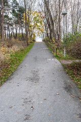 Uphill walking path with distance markings from the bottom.