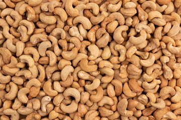 background of roasted cashew nuts, top view