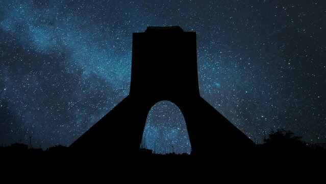 Azadi tower in Tehran, Iran: Time Lapse by Night with Stars and Milky Way in Background